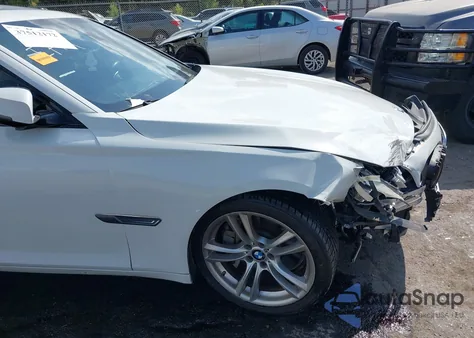 2015 BMW 750Li z USA, uszkodzony, nr VIN WBAYE8C52FD781788